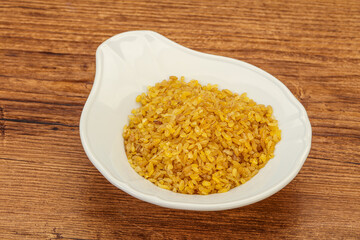 Vegetarian cuisine - dry bulgur for cooking