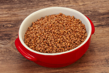 Raw buсkwheat cereal in the bowl