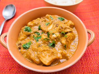 Indian chicken curry in cashew nut sauce with rice