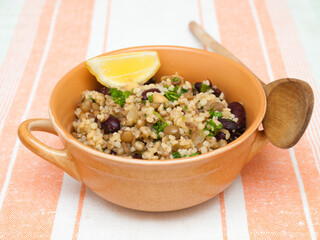 Vegan bulgur with lentils, beans and chickpeas