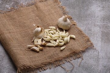 Raw garlic Cloves and Bulb. on barlup.