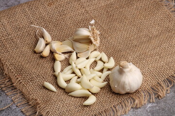 Raw garlic Cloves and Bulb. on barlup.