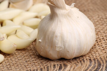 Raw garlic Cloves and Bulb. on barlup.