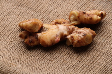 Fresh ginger on barlup. herb medical concept