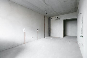 interior of the apartment without decoration in gray colors