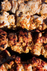 meat is grilled on a Sunny day.with a shallow depth of field