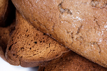 Black bread close-up. Texture on white background