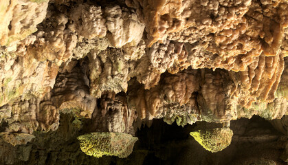 Stalacmites and pink calcite ceiling of Hoellgrotten Caves in Baar, Switzerland