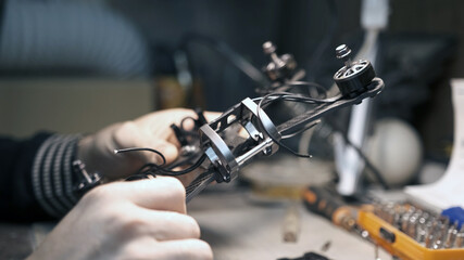 Man constructs a FPV drone from parts