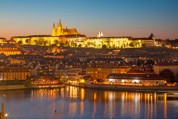 Prague - The Castle and Cathedral withe the Vltava river at dusk.