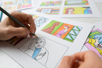 Artist animator draws a color storyboard. Sketches of illustrations for comics or cartoon.
