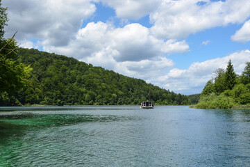 Fototapeta premium Plitvice Lakes National Park in Croatia - Boat Ride in the Peaceful Beautiful Lake 