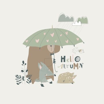 Funny animals under umbrella. Autumn time. Rainy weather