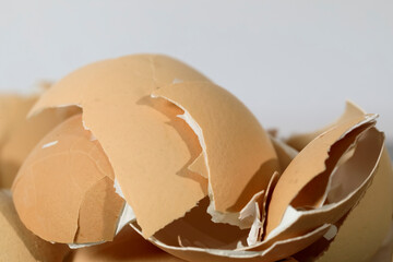 Empty and broken egg shells stacked