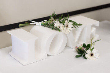 letters with the word love made of white cork