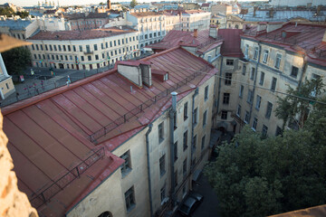 Roofs of houses in the city Saint-Petersburg. Beautiful views from the ancient roof. Walking on the rooftops of St. Petersburg. Russia. 