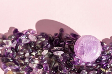 Obraz na płótnie Canvas Crystal minerals for meditation on pink background. Magic Rock for Healing stones.