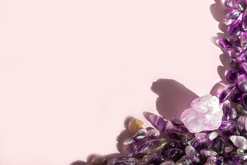 Crystal minerals for meditation on pink background. Magic Rock for Healing stones.