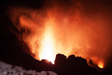 Live volcano eruption at Stromboli volcano in Italy. We contemplate the ash, lava and magma...