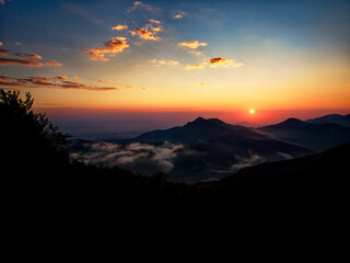 Landscape from Rhodope mountains in Bulgaria during sunset or sunrise. Small chapel and monastery near Borovo, Rhodopes
