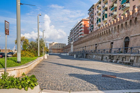 Waterfront Calata della Rocca with the protective wall in Civitavecchia, Italy