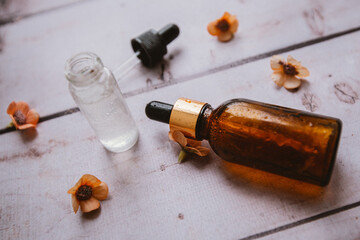 
bottles and pipettes with hyaluronic serum for cosmetic and beauty treatments