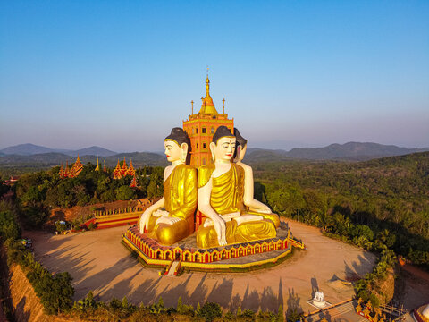 Aerial by drone of the huge sitting Buddhas, Ko Yin Lay, Pupawadoy Monastery near Ye, Mon state