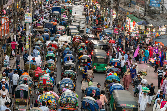 Overcrowded completely with rickshaws, a street in the center of Dhaka