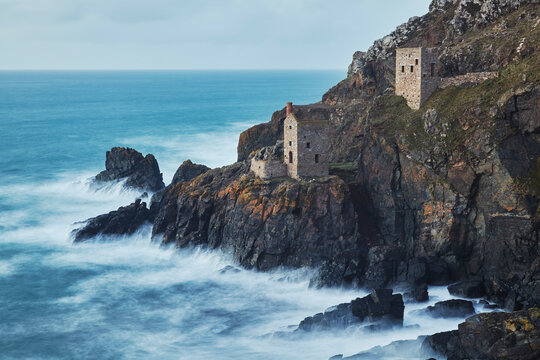 A dusk view of the iconic cliffside ruins of Botallack tin mine, near St. Just, near Penzance, in west Cornwall