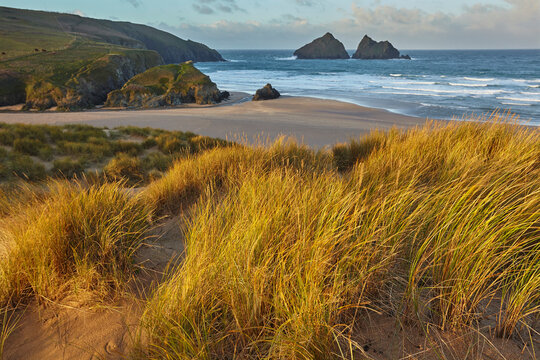 Sand dunes at Holywell Bay, a place made famous by BBC drama Poldark, near Newquay, north Cornwall