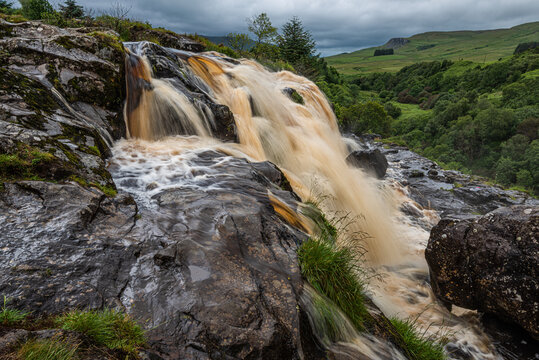 The Loup of Fintry waterfall on the River Endrick, located approximately two miles from Fintry village, near Stirling, Scotland