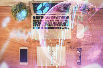 Multi exposure of financial chart drawing over table background with computer. Concept of research. Top view.
