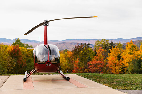 Helicopter on Landing Pad with Fall Foliage