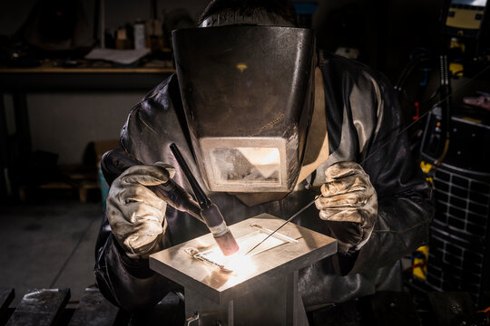 Welder that welds aluminum in his workshop