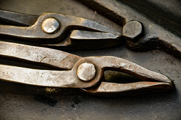 The tool uses a blacksmith in a blacksmith shop