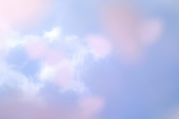 Fototapeta premium 桜の形をした紙の花びらと青空