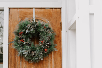 Christmas Wreath for sale and then on a door