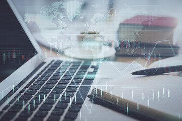 Double exposure of financial chart drawing and desktop with coffee and items on table background. Concept of forex market trading