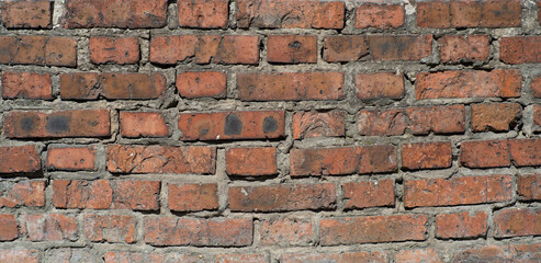 the texture of the old wall from red bricks as background
