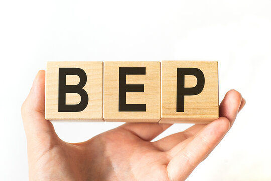 Hand holds wooden cubes with letters bep. Medicine concept image.