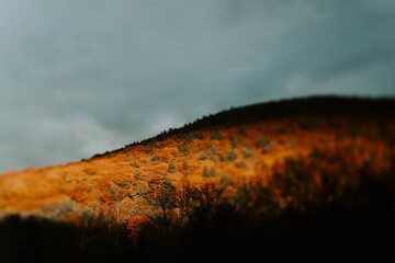The sun setting over the catskill mountains in late autumn
