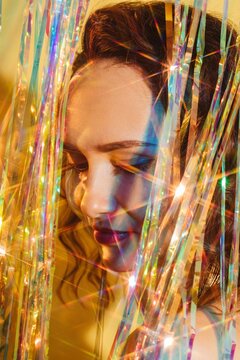 Beauty portrait with shining xmas tinsel