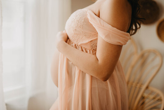 Maternity images of a beautiful young hispanic woman.