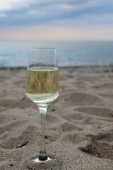 glass of wine on the beach