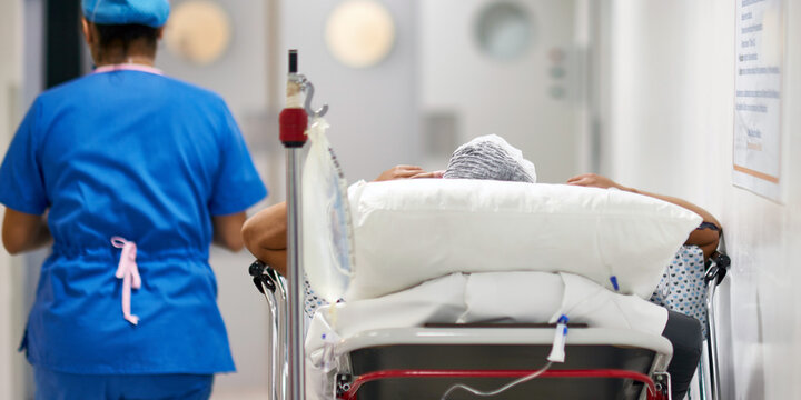 Nurse and patient in bed