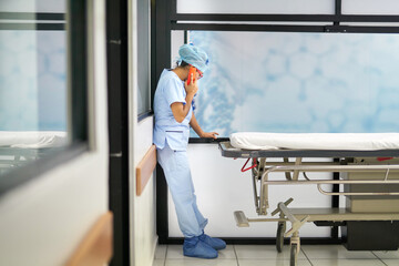 Doctor having a serious phone call