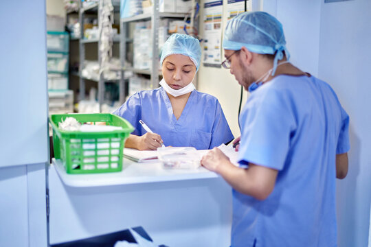 Hospital Technician Requesting Supplies From A Medical Warehouse