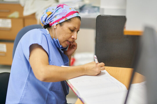 Hospital worker doing scheduling