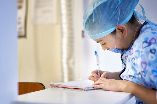 Nurse is taking a record for drug orders