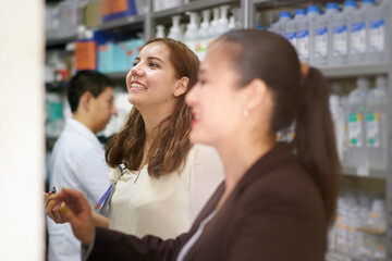 Pharmacy workers doing inventory
